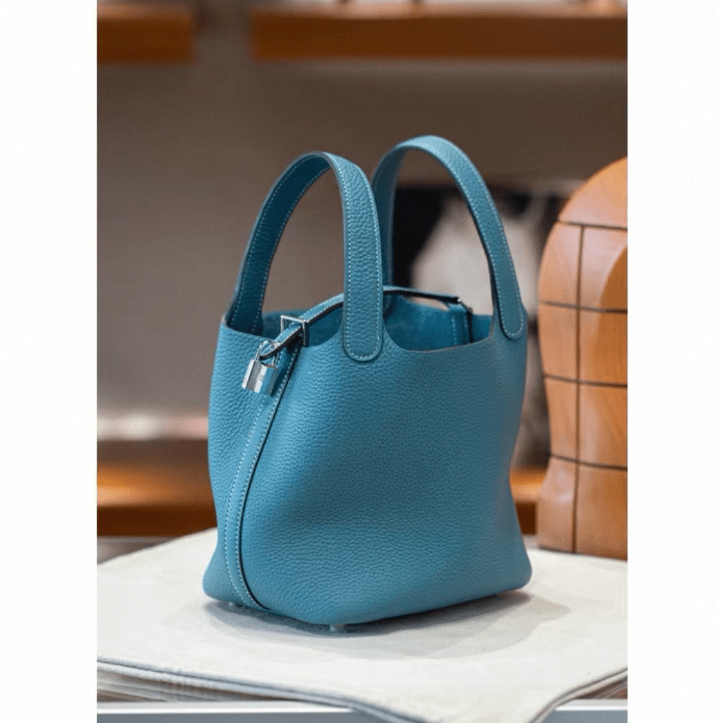 Bucket Bag mit Schloss | Geschmeidiges Volumen in strukturiertem TC - Vollrindleder - Giovanni Battaglia