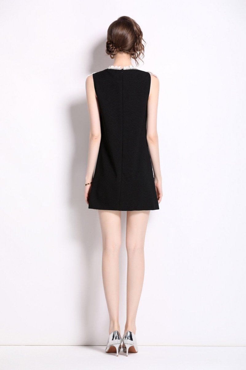 Schwarzes Kleid mit Spitzenkragen - Giovanni Battaglia